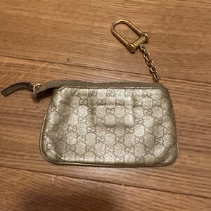 Gucci monogram coin purse, gold